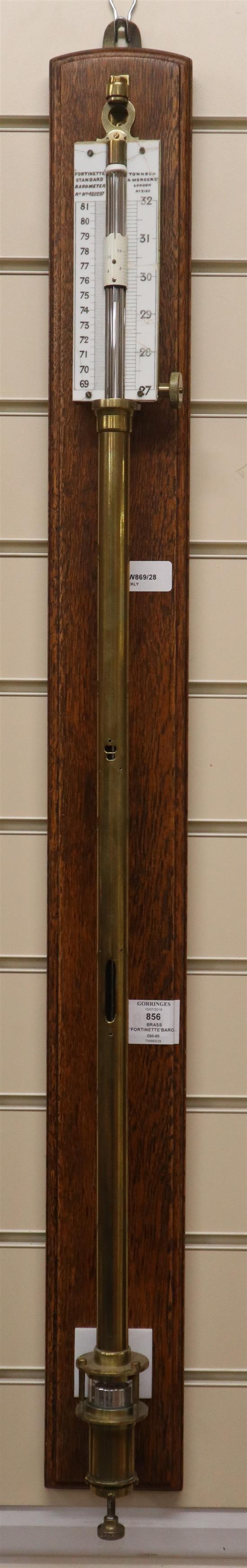 A brass Fortinette standard barometer by Towson & Mercer Ltd, London, on oak mount H.104cm